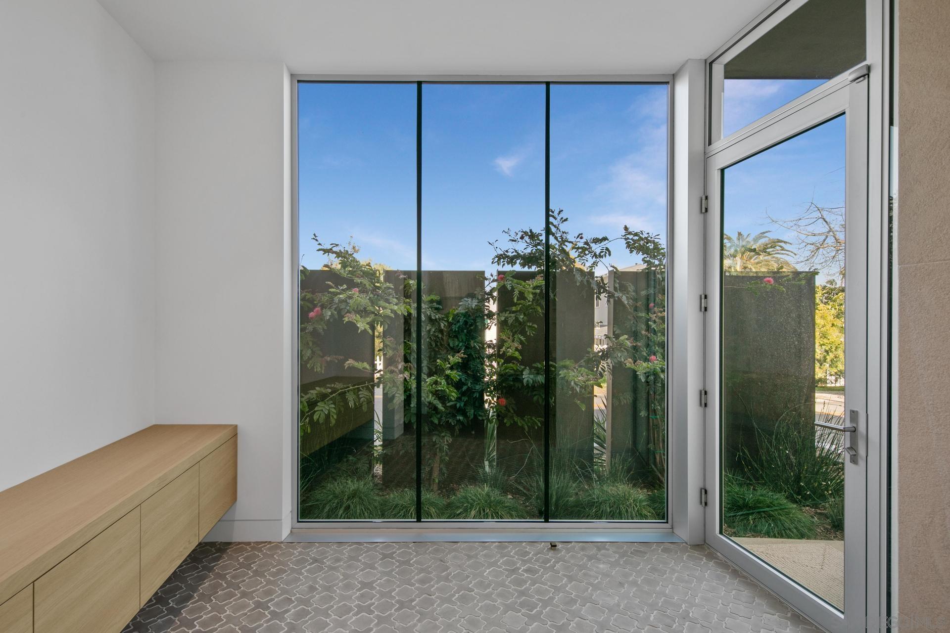 664 Cornish Drive Encinitas, CA 92024 - Photo 32 of 46 a view of a glass door and a living room