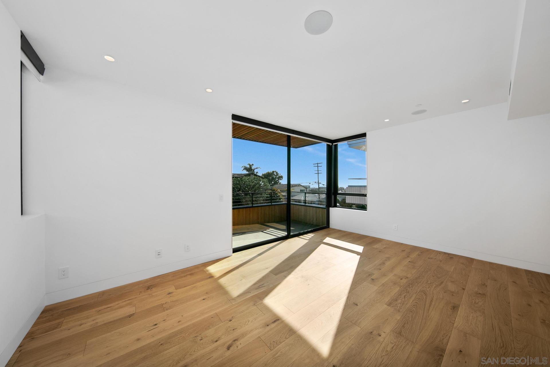 664 Cornish Drive Encinitas, CA 92024 - Photo 10 of 46 a view of an empty room with a window