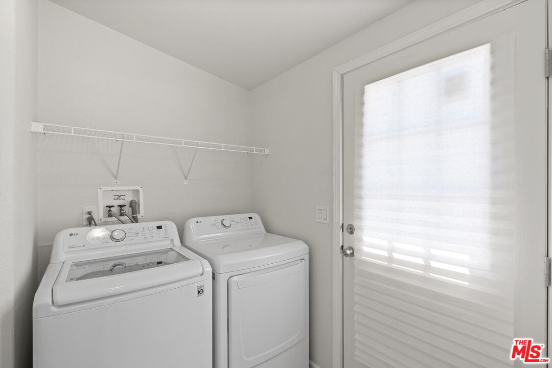 30473 Mulholland Highway, Unit 174 Agoura Hills, CA 91301 - Photo 23 of 36 a utility room with dryer and washer
