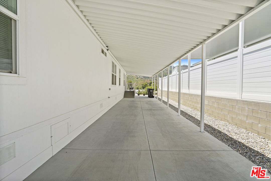 30473 Mulholland Highway, Unit 174 Agoura Hills, CA 91301 - Photo 25 of 36 a view of livingroom with stairs