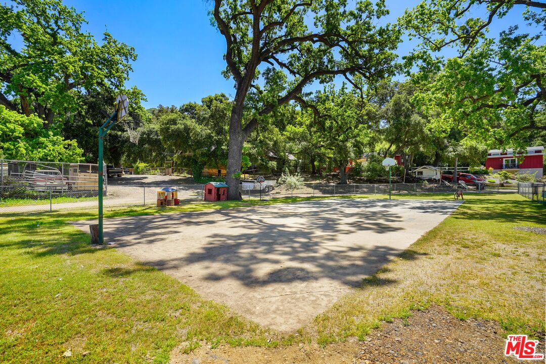 30473 Mulholland Highway, Unit 174 Agoura Hills, CA 91301 - Photo 35 of 36 a view of a swimming pool with a patio