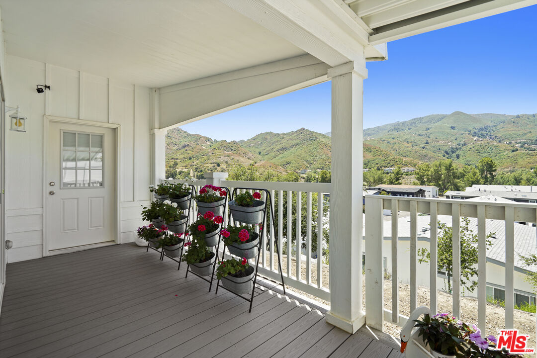 30473 Mulholland Highway, Unit 174 Agoura Hills, CA 91301 - Photo 4 of 36 a view of a city from a balcony