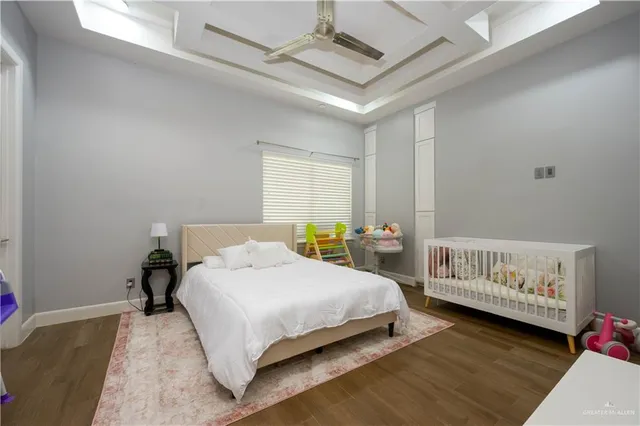a living room with fireplace furniture and a window