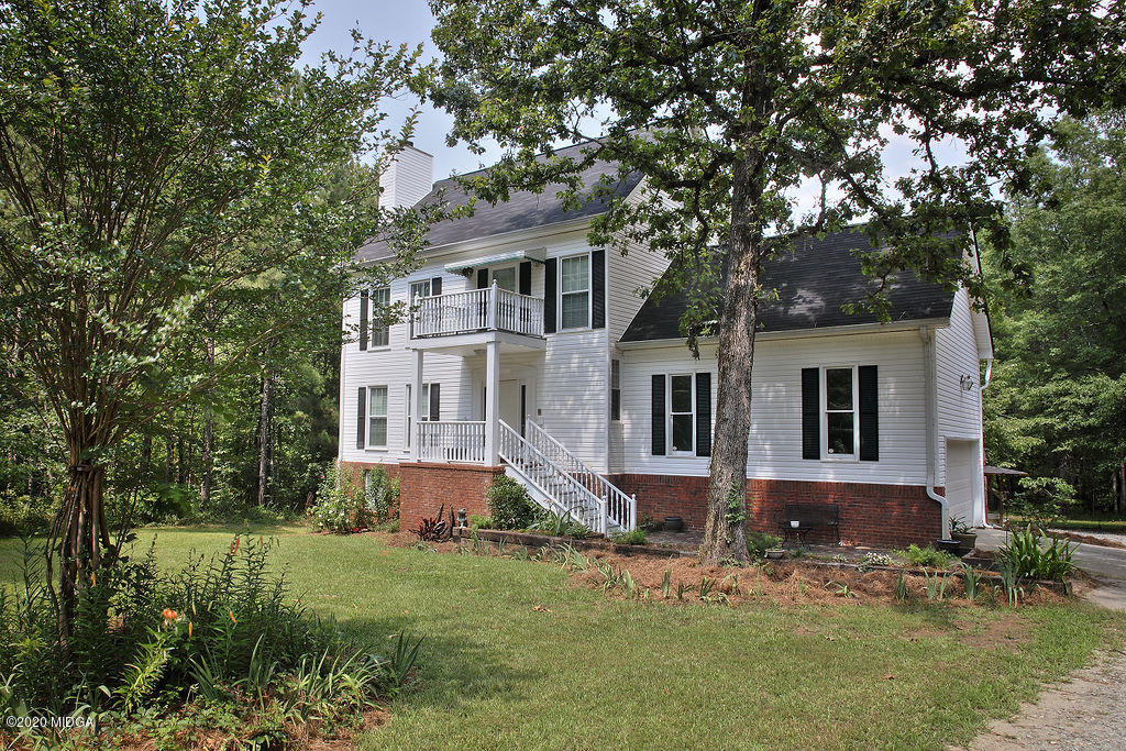 front view of house with a yard