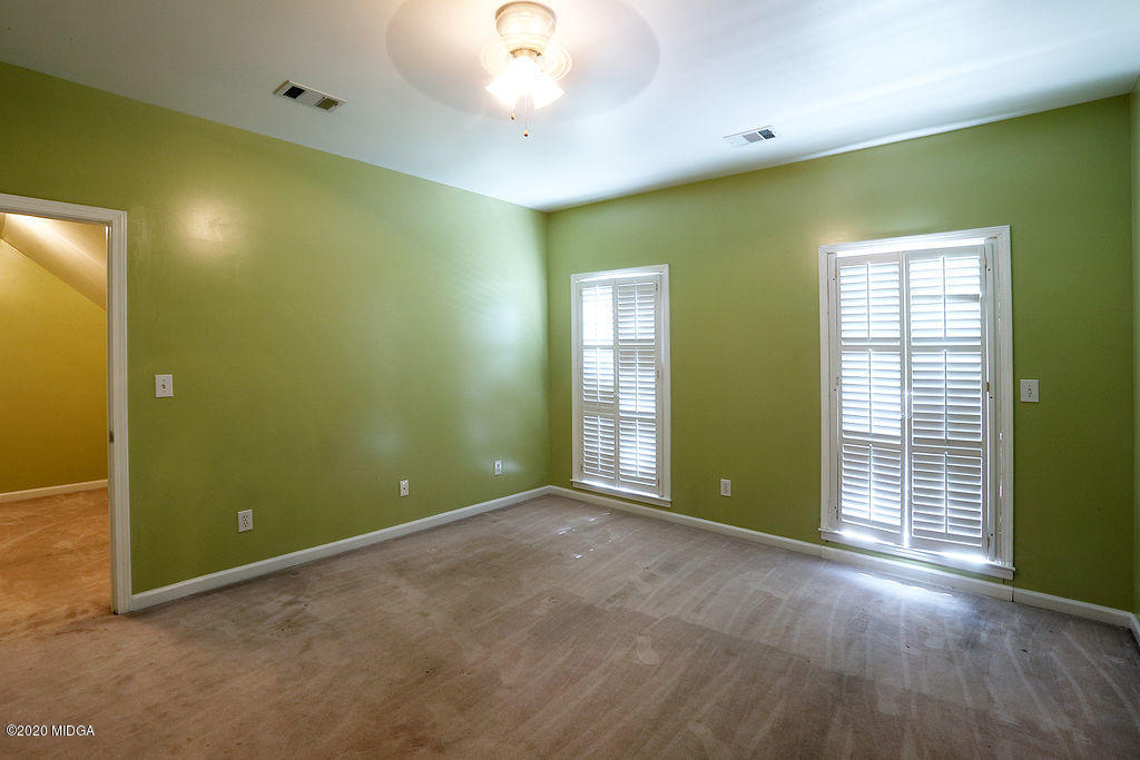 411 Lamar Road Macon, GA 31220 - Photo 13 of 22 an empty room with windows and closet