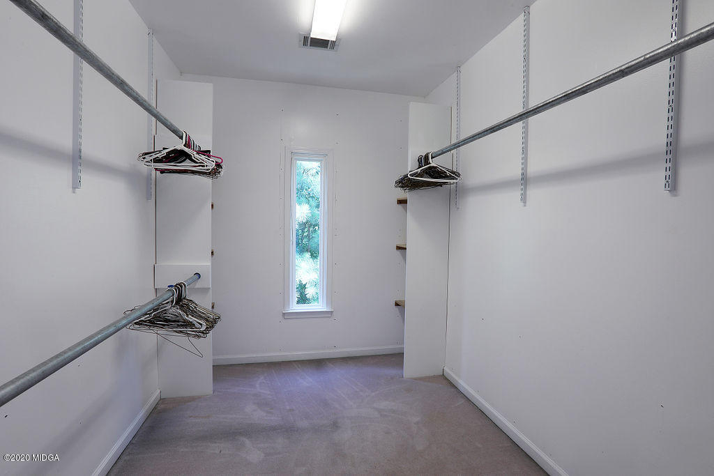 411 Lamar Road Macon, GA 31220 - Photo 9 of 22 a view of a hallway with a window