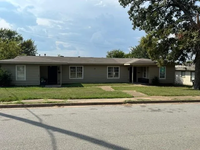 a view of house with outdoor space and street view