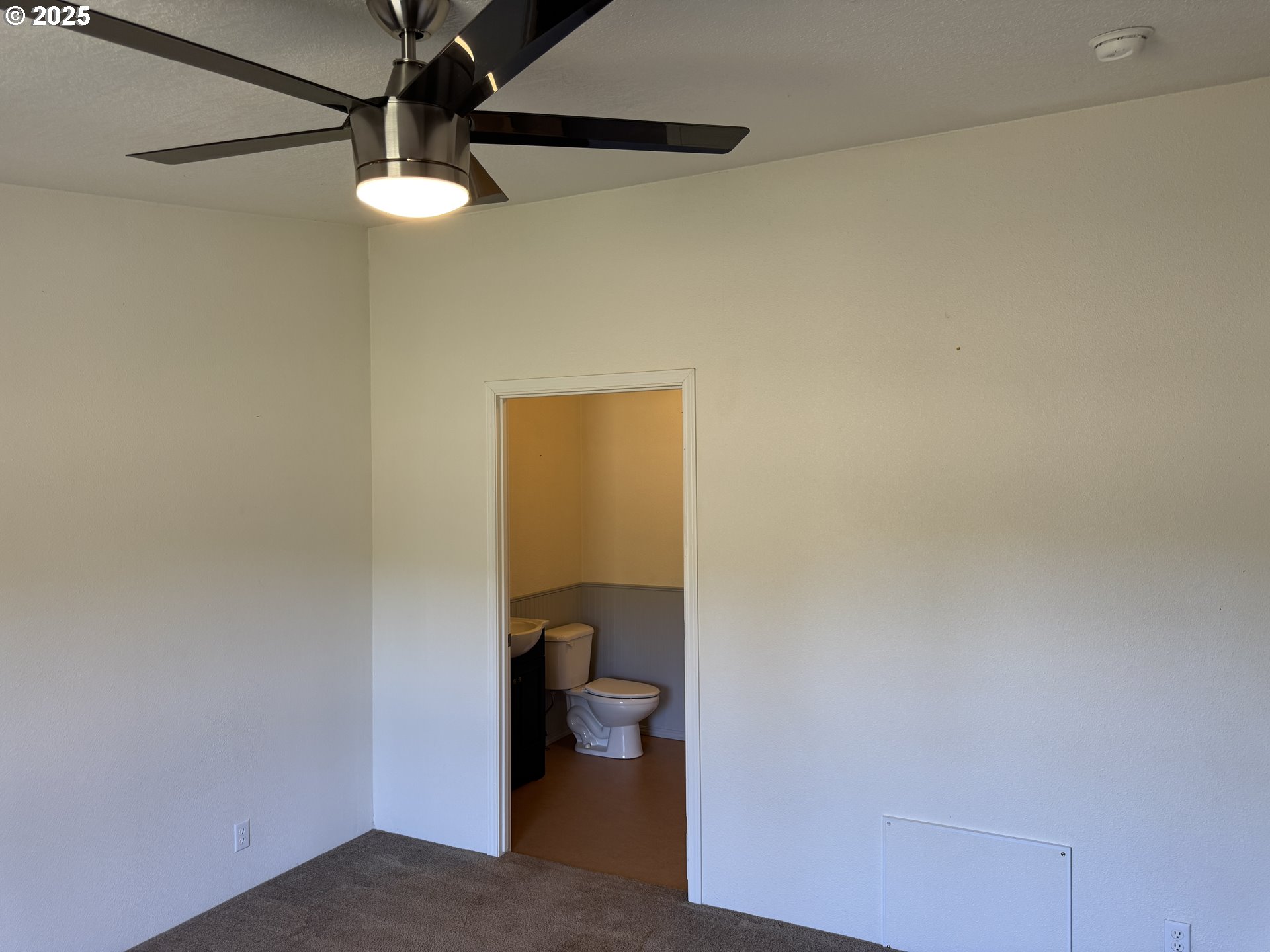 1924 Highway 97 Goldendale, WA 98620 - Photo 19 of 40 a view of a room with a hanging light and hardwood