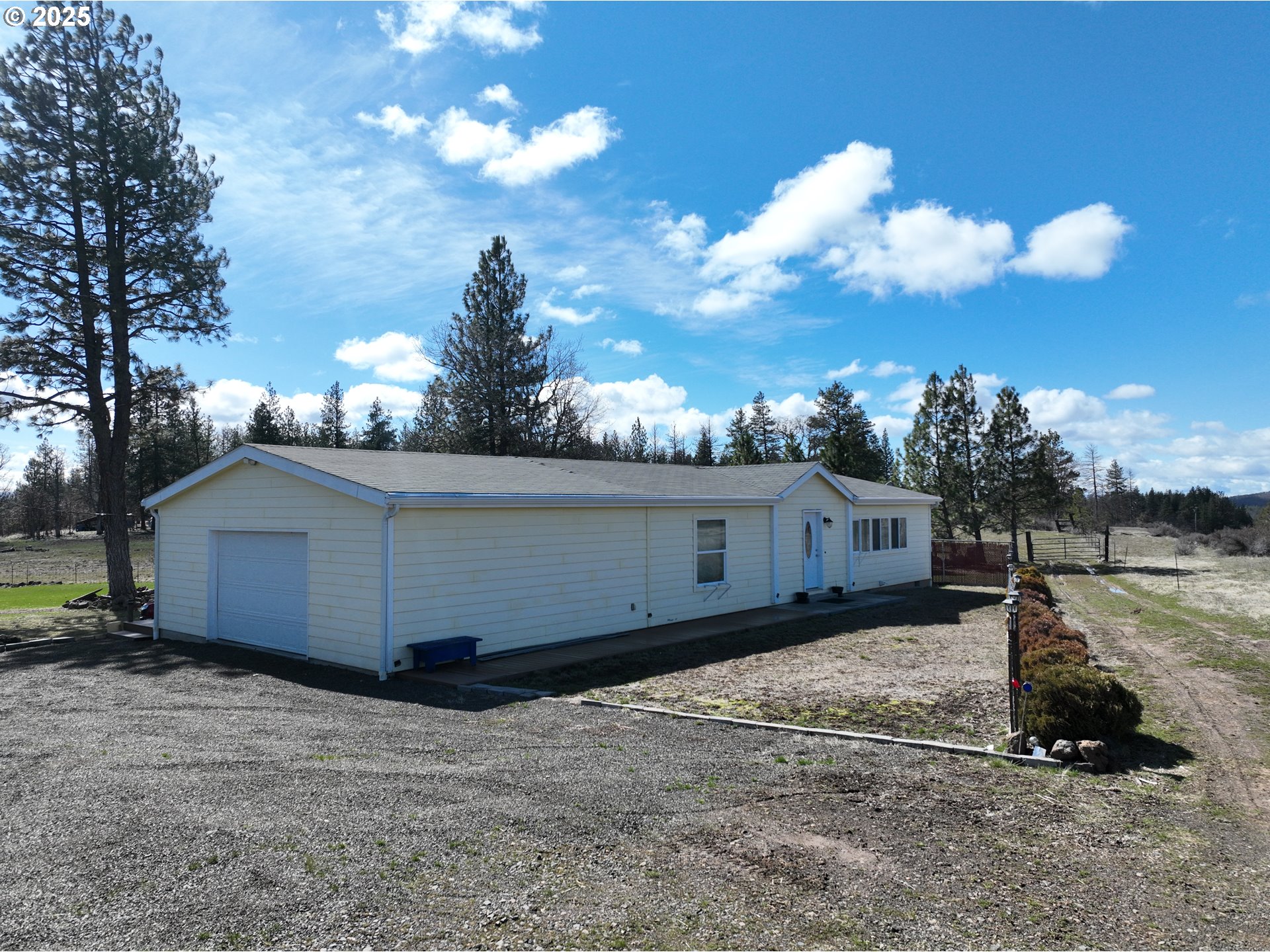 1924 Highway 97 Goldendale, WA 98620 - Photo 2 of 40 a view of a house with a yard