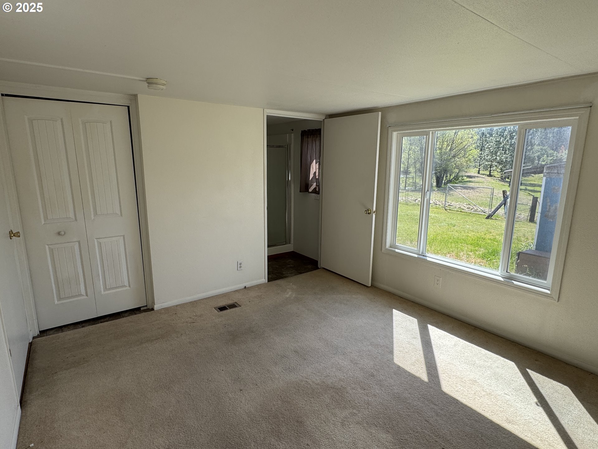 1924 Highway 97 Goldendale, WA 98620 - Photo 33 of 40 a view of an empty room with a window