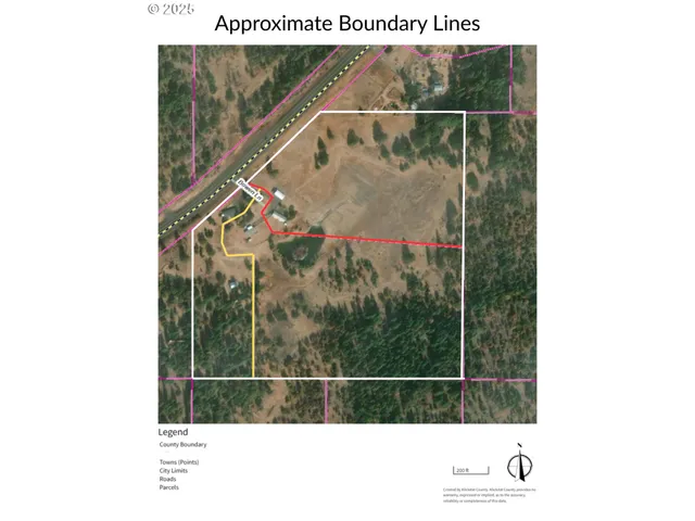 a view of room with window and wooden floor