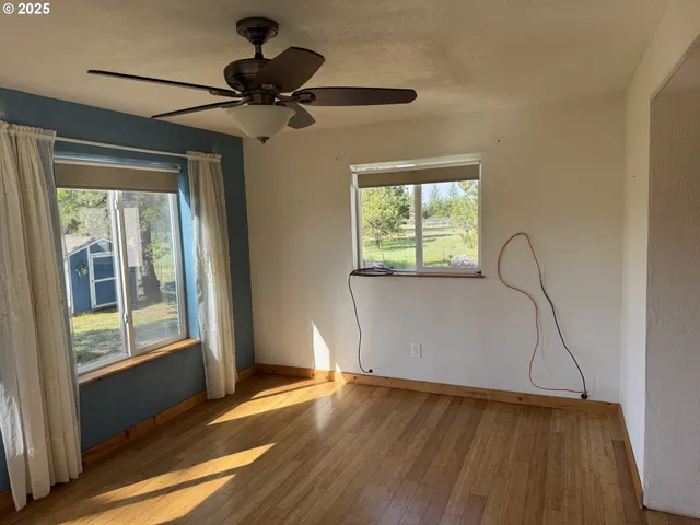 a view of an empty room and window