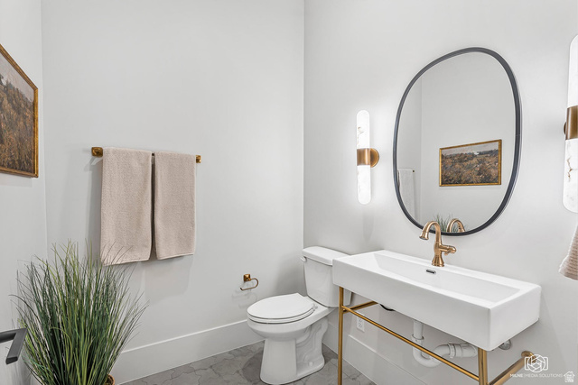 1468 South Red Cliffs Temple Lane St. George, UT 84790 - Photo 21 of 64 Half bath with toilet and baseboards