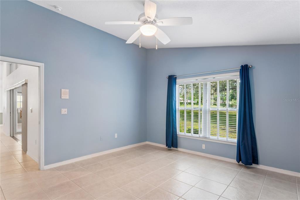11330 Leeds Drive Spring Hill, FL 34609 - Photo 18 of 78 a view of an empty room with a window