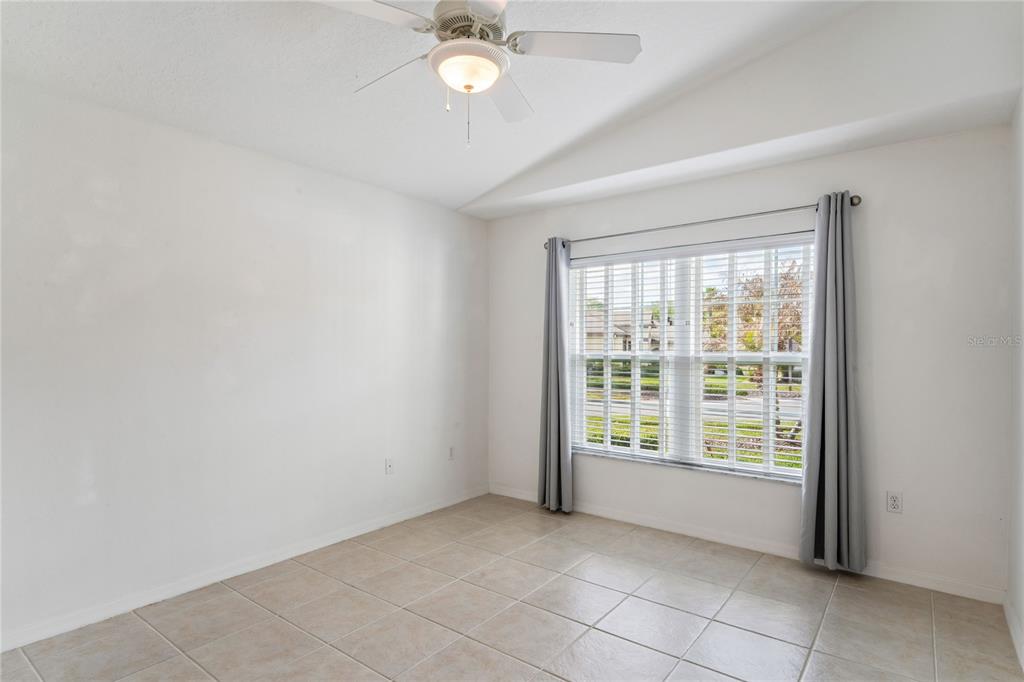 11330 Leeds Drive Spring Hill, FL 34609 - Photo 24 of 78 a view of an empty room with a window