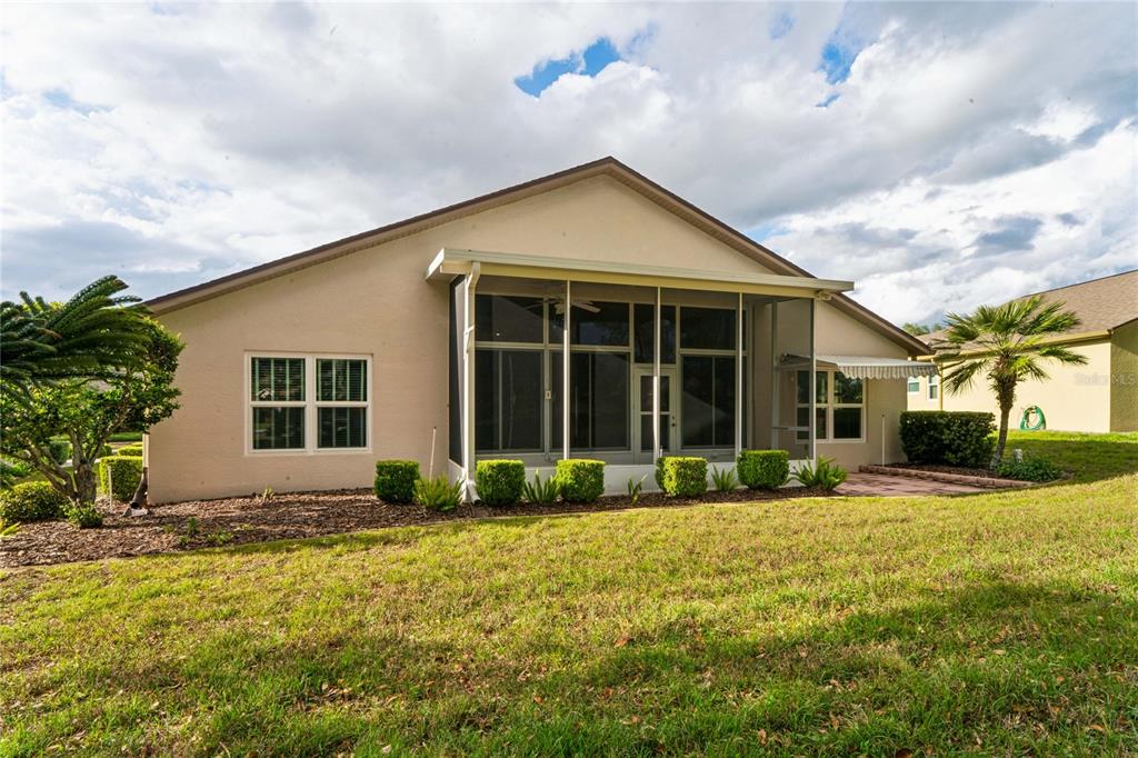 11330 Leeds Drive Spring Hill, FL 34609 - Photo 40 of 78 a front view of a house with a yard