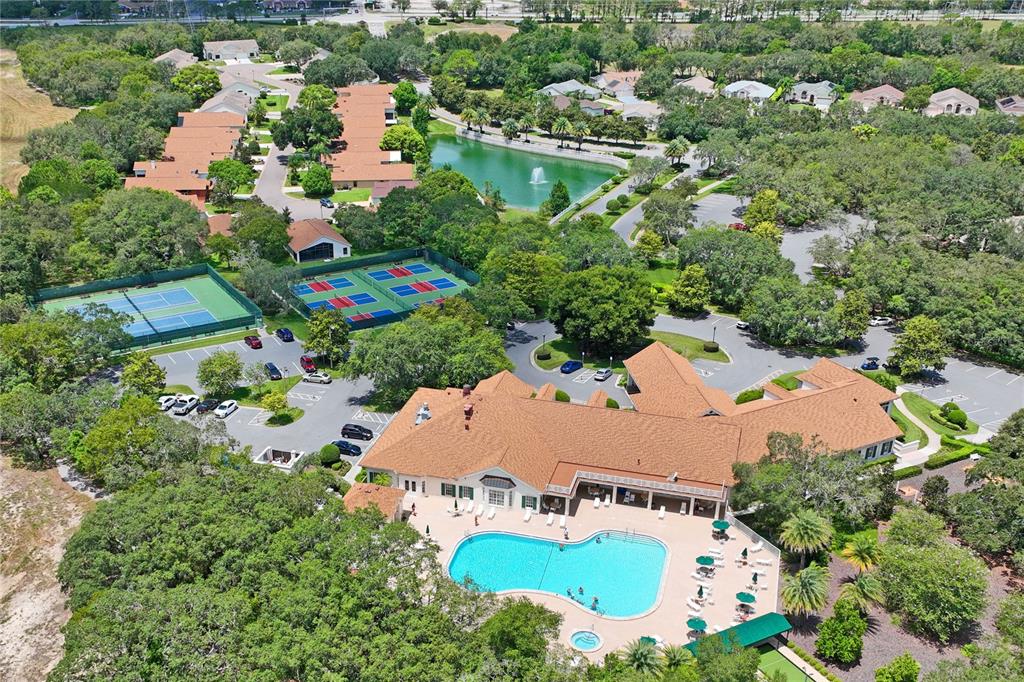11330 Leeds Drive Spring Hill, FL 34609 - Photo 65 of 78 an aerial view of house with yard swimming pool and outdoor seating