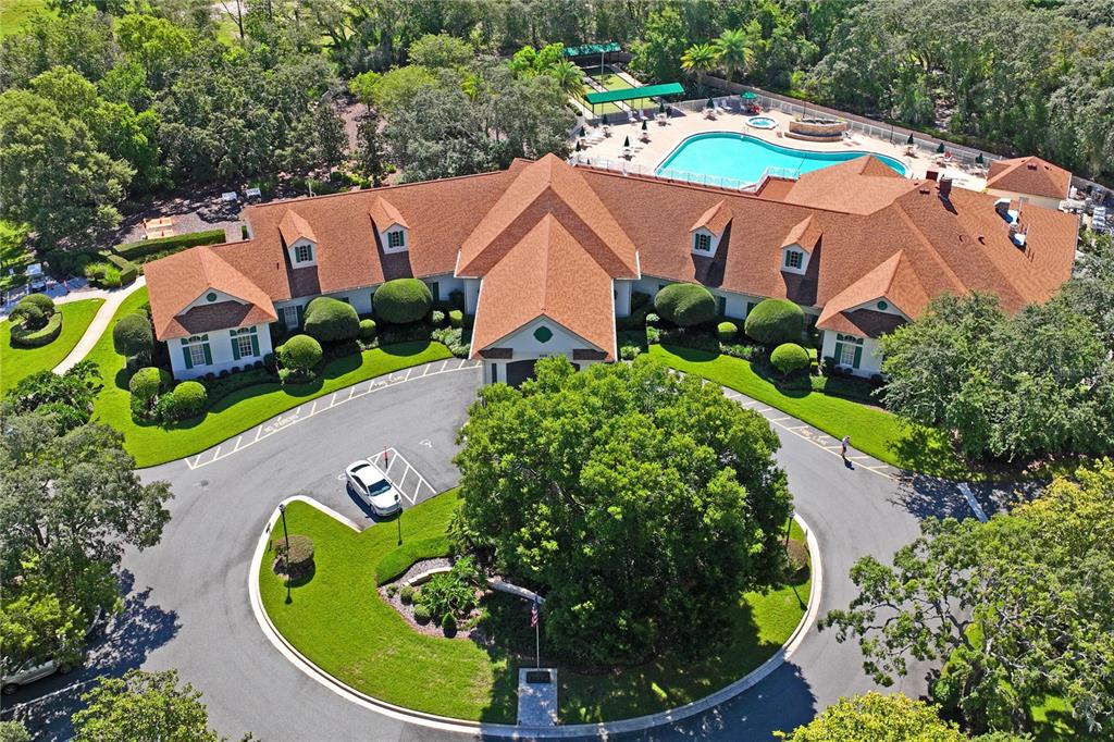 11330 Leeds Drive Spring Hill, FL 34609 - Photo 77 of 78 an aerial view of a house with a swimming pool and outdoor seating