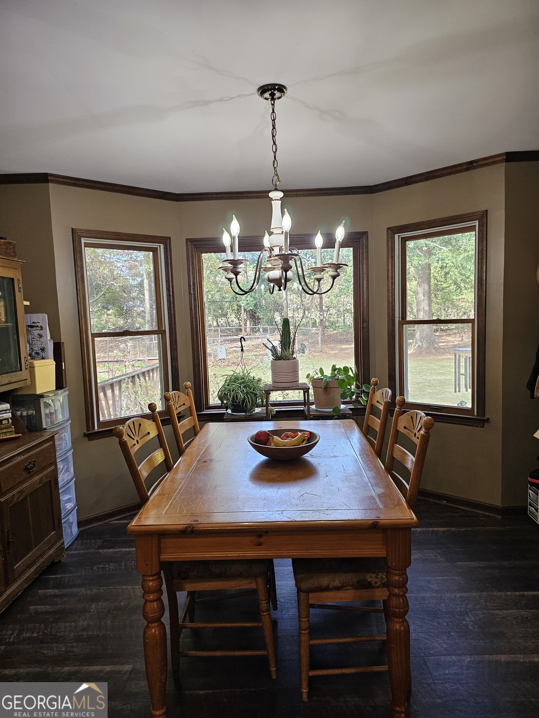 228 Honeysuckle Road Monticello, GA 31064 - Photo 17 of 35 a view of a dining room with furniture window and wooden floor