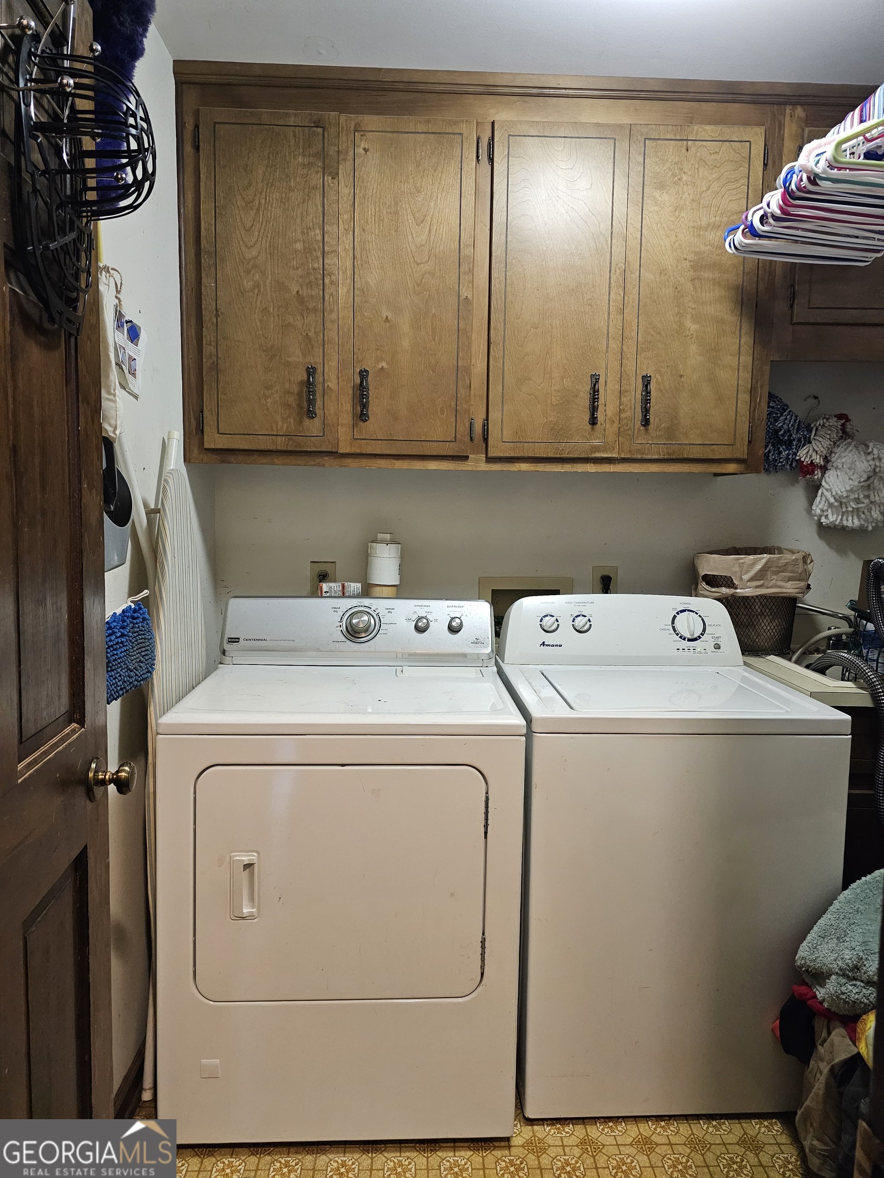 228 Honeysuckle Road Monticello, GA 31064 - Photo 20 of 35 a utility room with dryer and washer