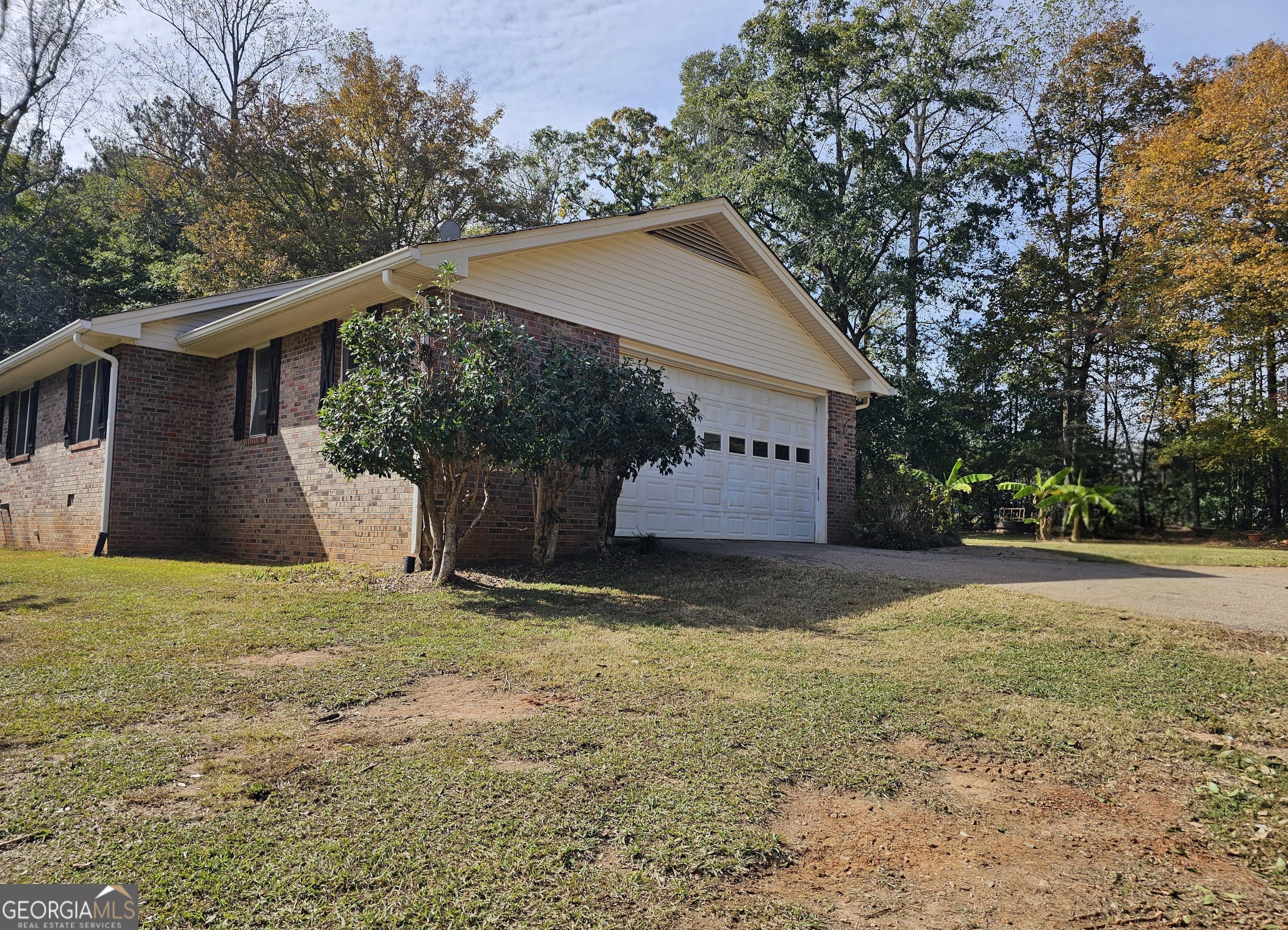 228 Honeysuckle Road Monticello, GA 31064 - Photo 34 of 35 a view of a house with a yard