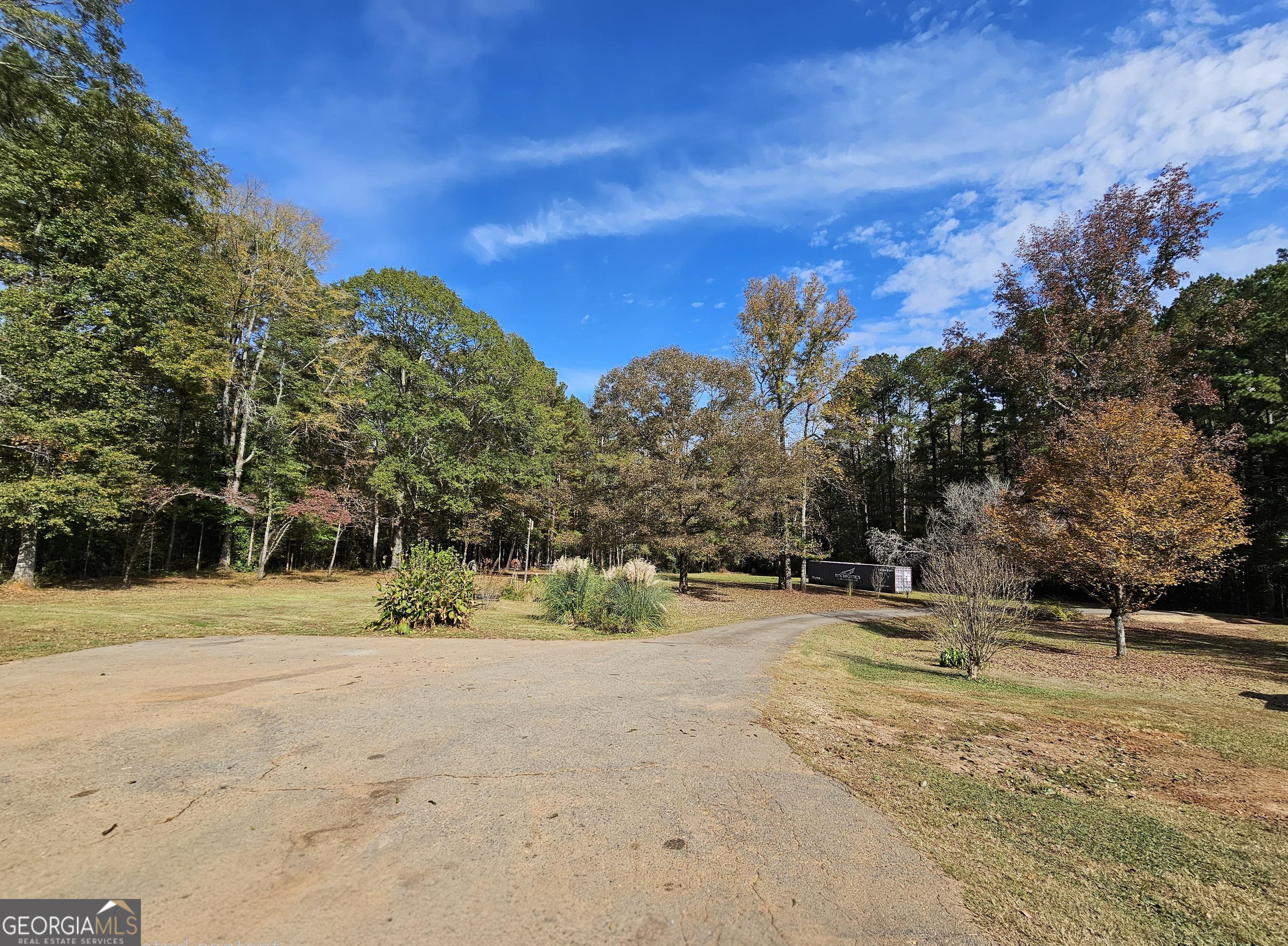 228 Honeysuckle Road Monticello, GA 31064 - Photo 4 of 35 a view of road with trees