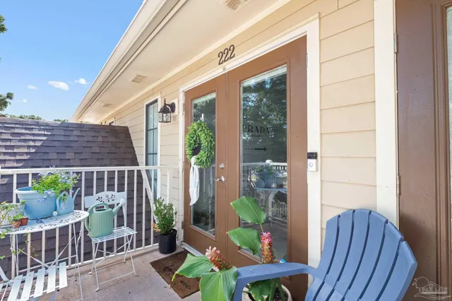 a view of a porch with furniture