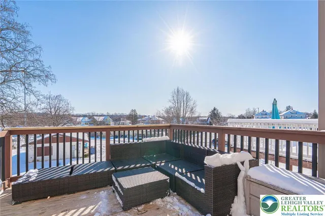a view of a two chairs on the deck