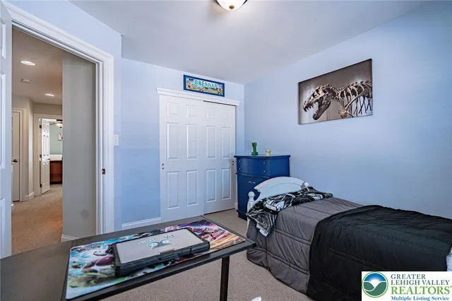 a bathroom with a sink a toilet a shower and a mirror