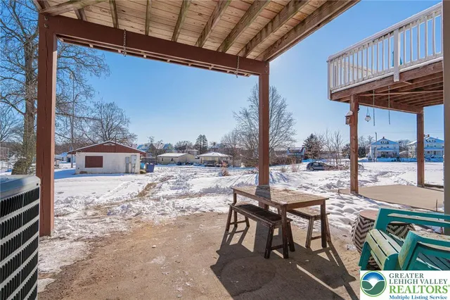a view of a building with large trees