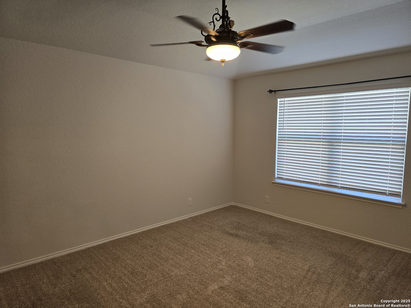 8207 Tortoise Trail Converse, TX 78109 - Photo 15 of 30 an empty room with a window