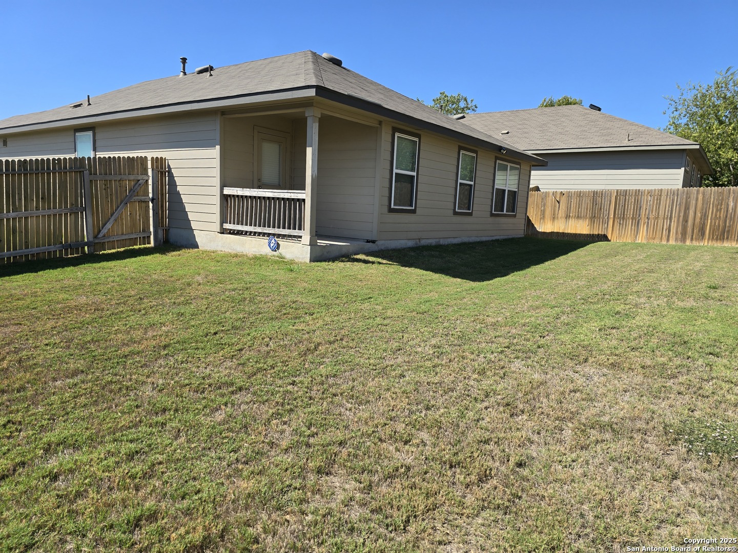 8207 Tortoise Trail Converse, TX 78109 - Photo 24 of 30 a front view of a house with yard