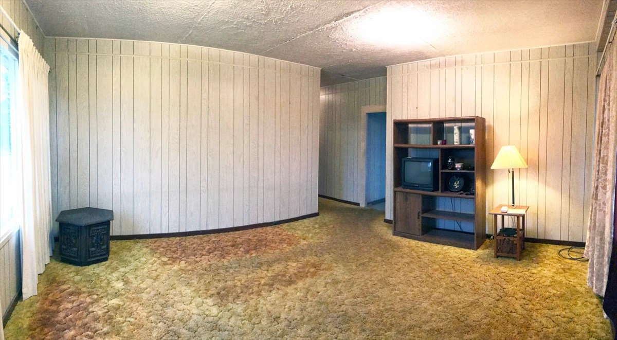 17-1084 Old Volcano Road Mountain View, HI 96771 - Photo 1 of 1 a view of an empty room with furniture and a window