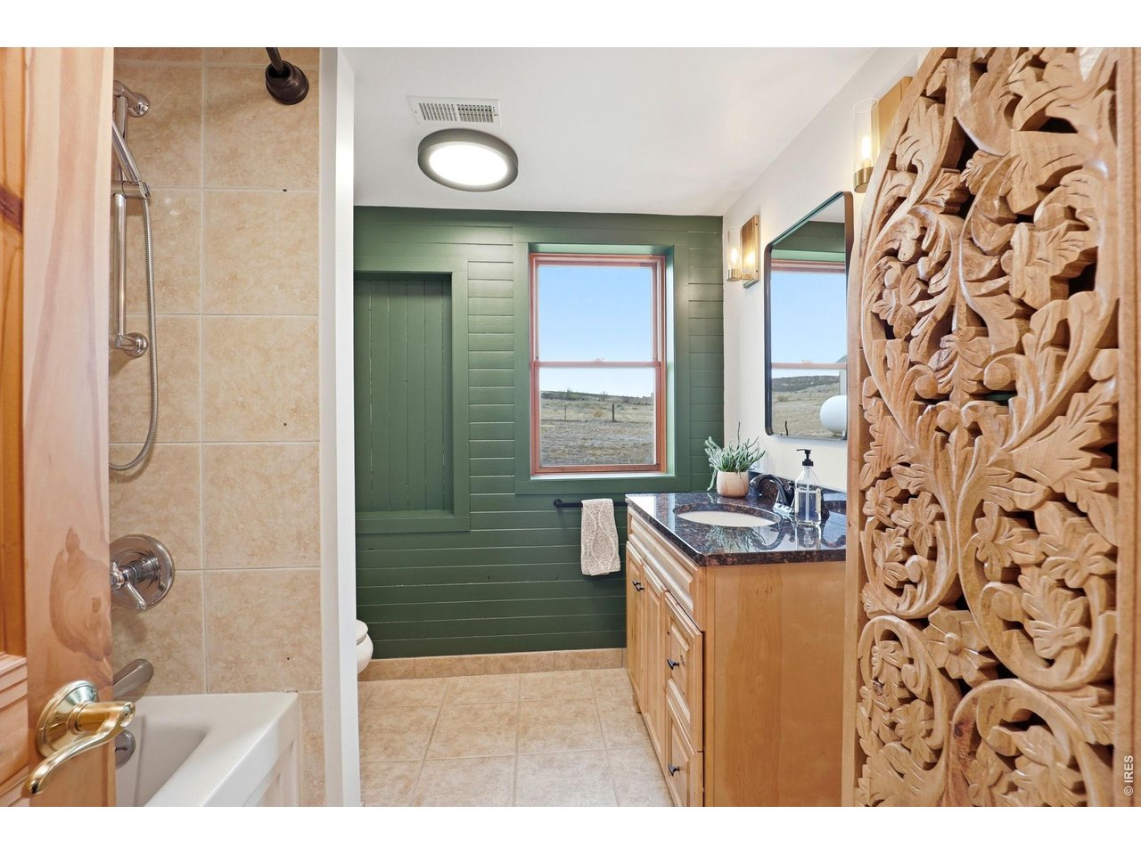 10320 Miners Lake Road Fort Collins, CO 80524 - Photo 13 of 47 Main level bathroom - right across the hallway