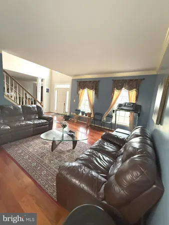 a living room with a bed