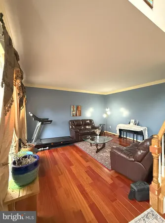 a bed room with two beds and a couch