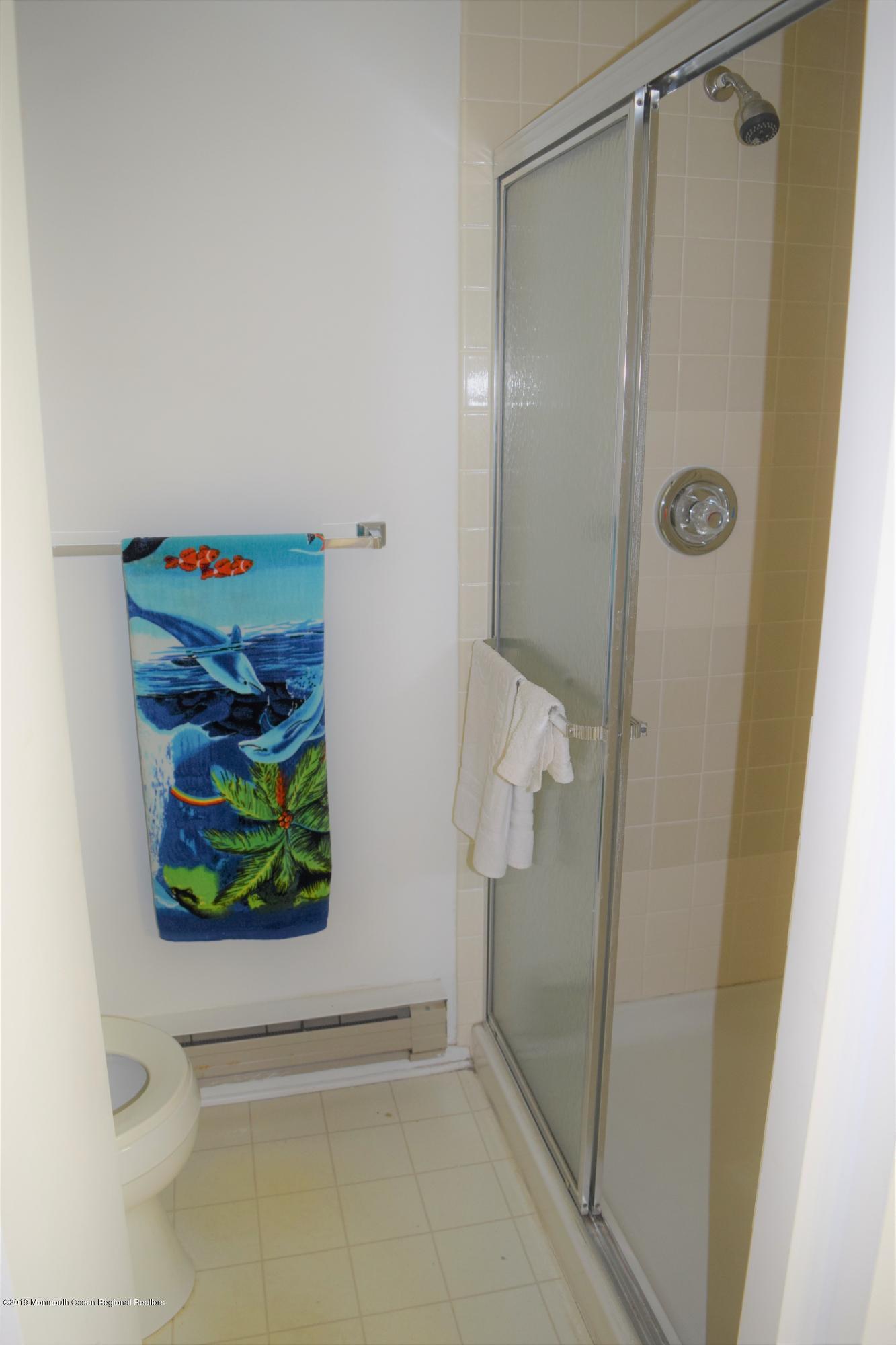 9 B Sunset Road Whiting, NJ 08759 - Photo 27 of 54 a bathroom with a shower