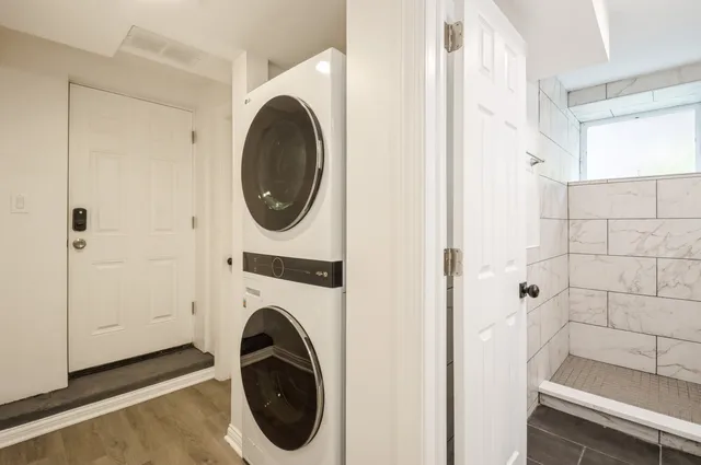 a utility room with dryer and washer