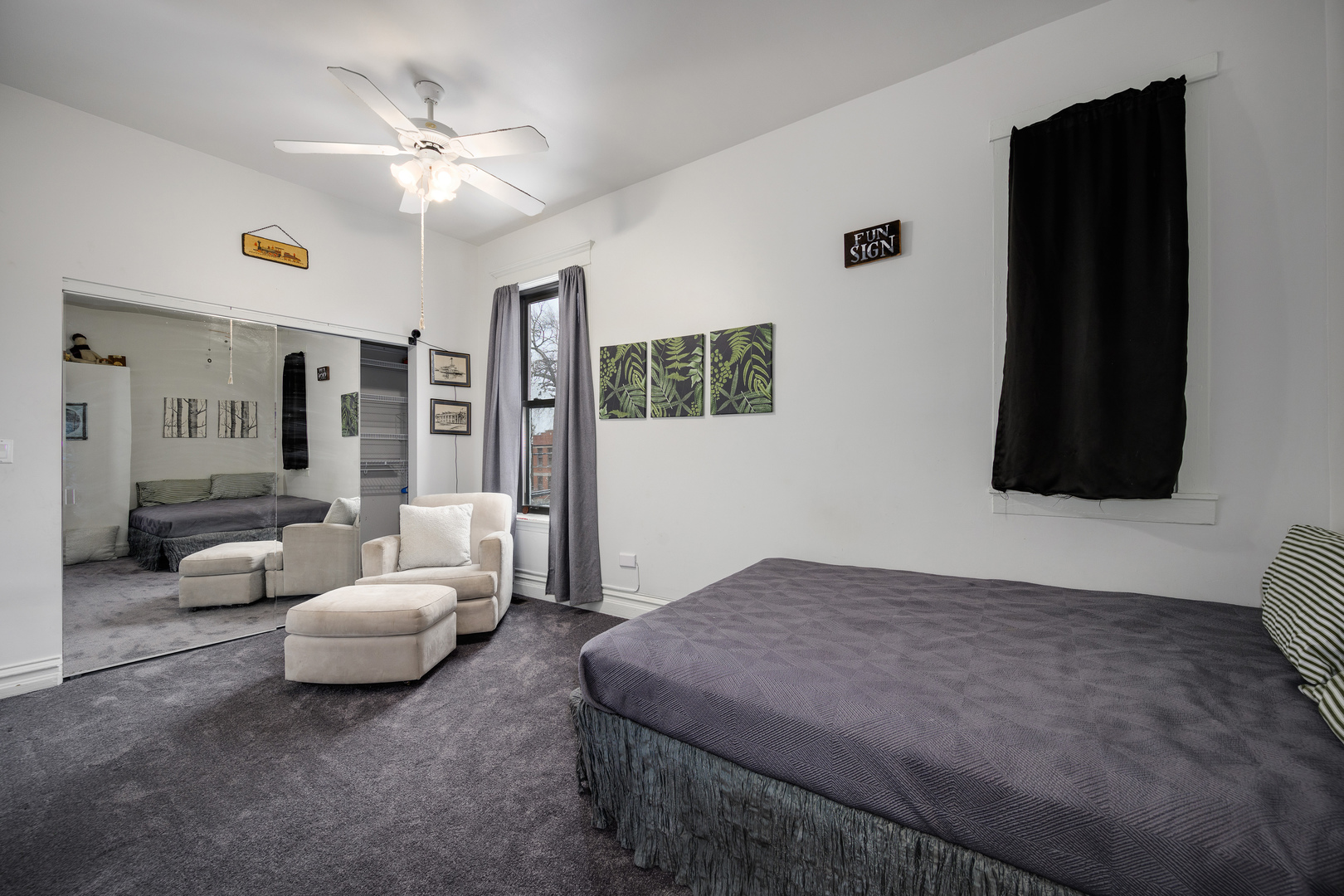 2851 West Division Street Chicago, IL 60622 - Photo 17 of 22 a spacious bedroom with a bed and couch