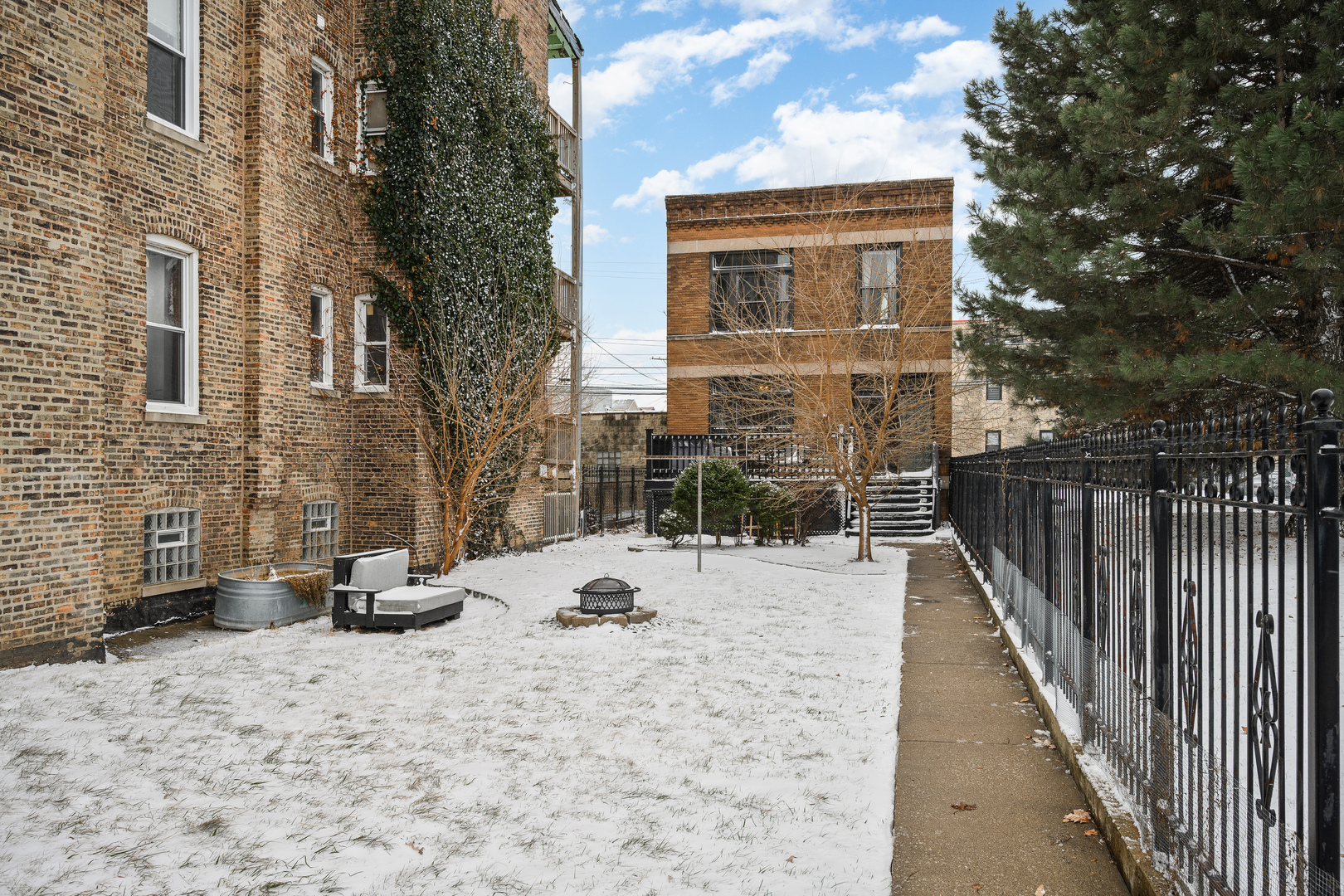 2851 West Division Street Chicago, IL 60622 - Photo 2 of 22 a view of a terrace with a snow
