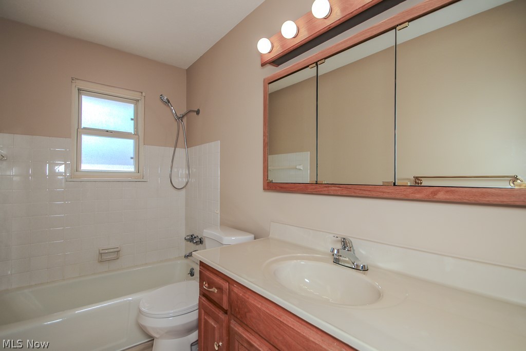 30224 Regent Road Wickliffe, OH 44092 - Photo 11 of 27 Bathroom featuring vanity and shower / bath combination