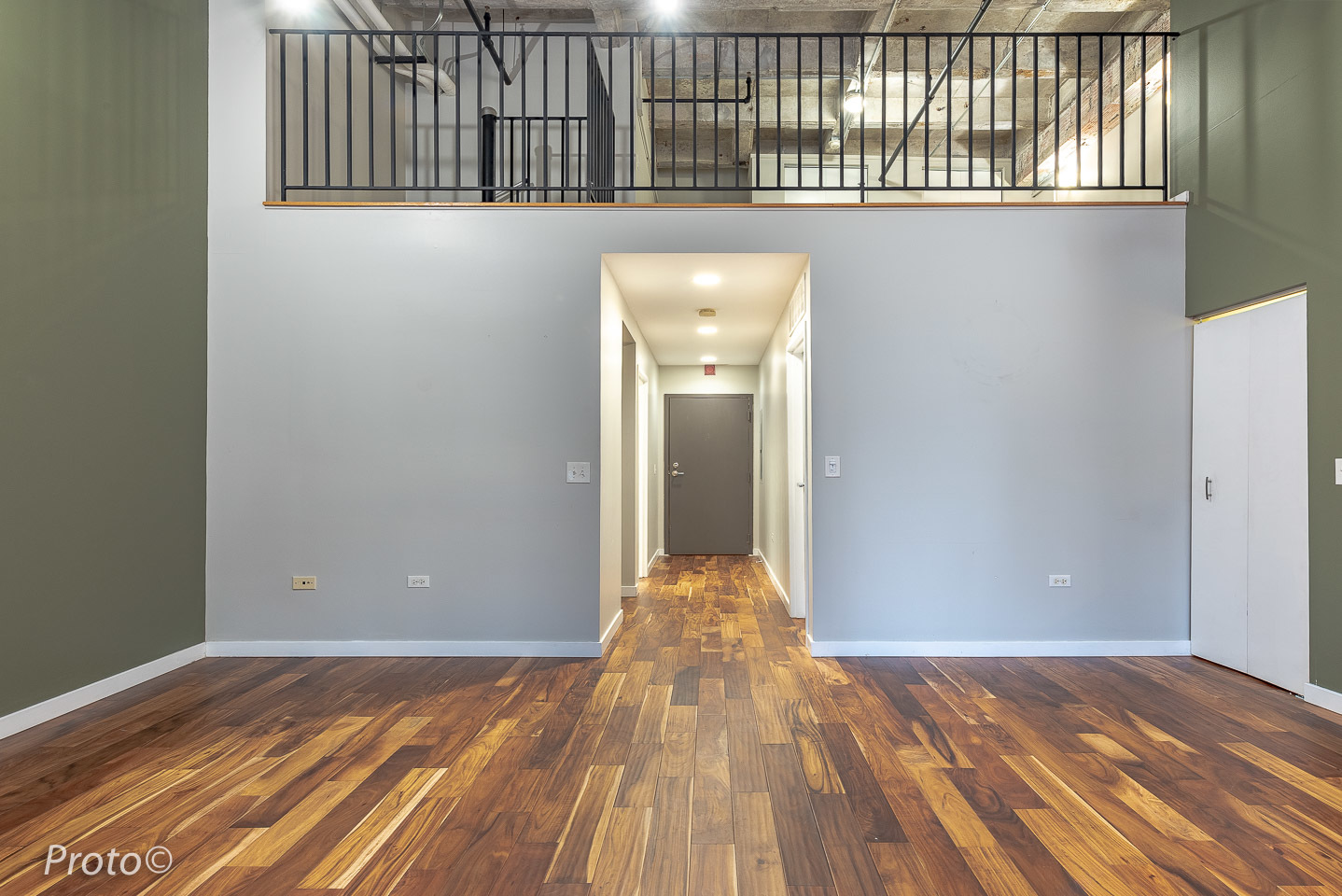 20 North State Street, Unit 1012 Chicago, IL 60602 - Photo 11 of 26 a view of a room with wooden floor and staircase