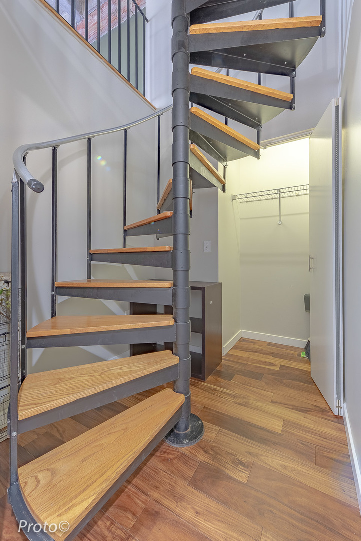 20 North State Street, Unit 1012 Chicago, IL 60602 - Photo 12 of 26 a view of a staircase