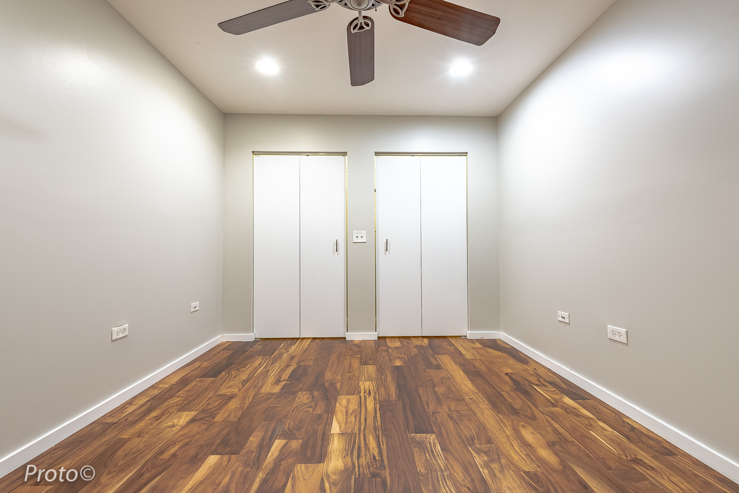 20 North State Street, Unit 1012 Chicago, IL 60602 - Photo 19 of 26 an empty room with wooden floor and windows