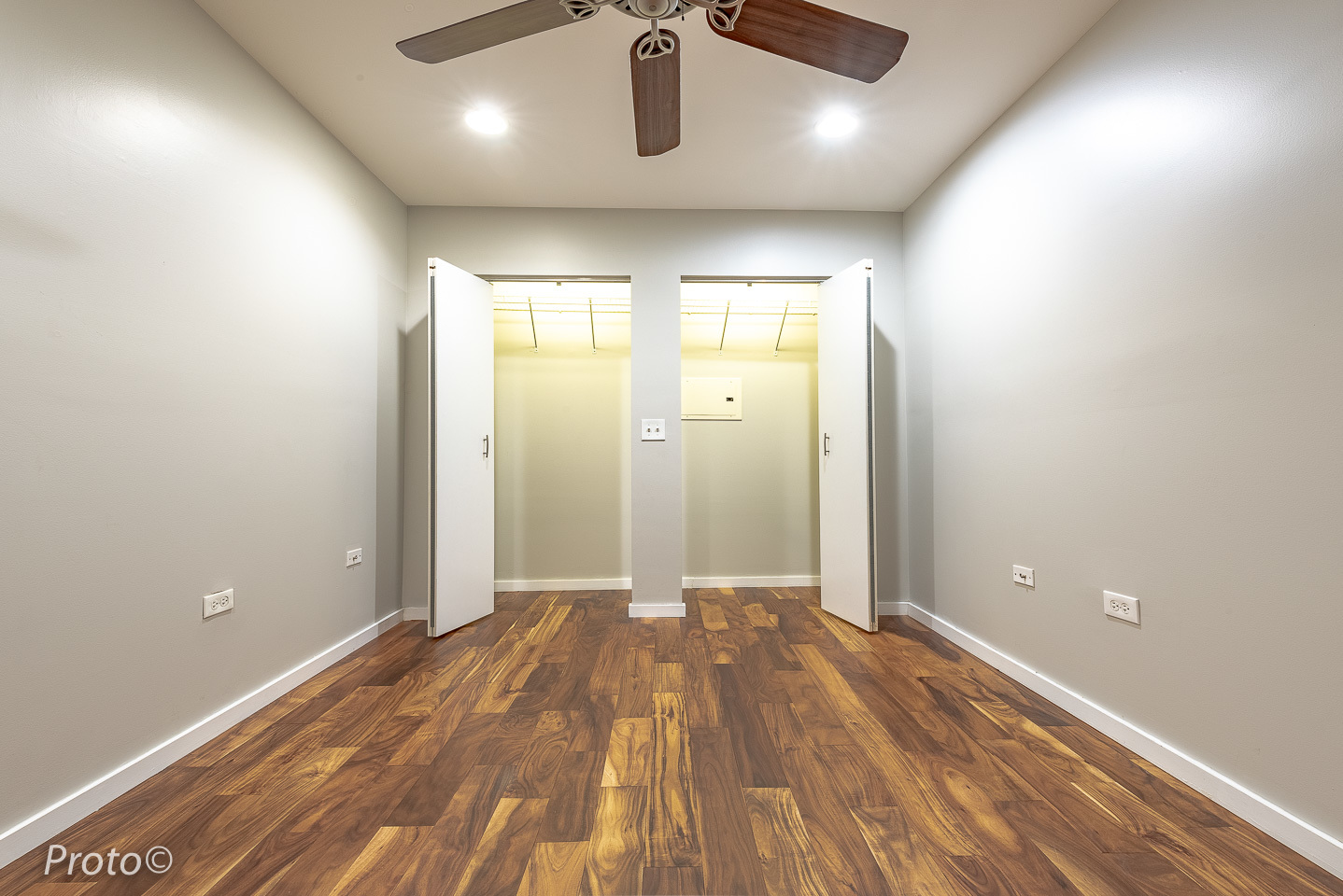 20 North State Street, Unit 1012 Chicago, IL 60602 - Photo 20 of 26 an empty room with wooden floor and windows