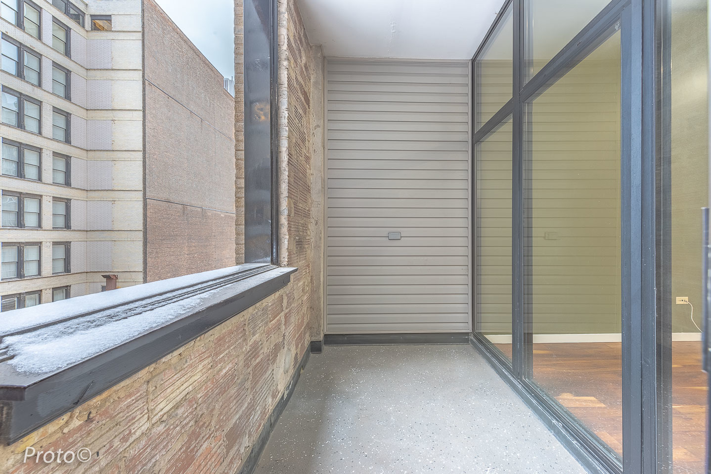 20 North State Street, Unit 1012 Chicago, IL 60602 - Photo 24 of 26 a view of a balcony from a window