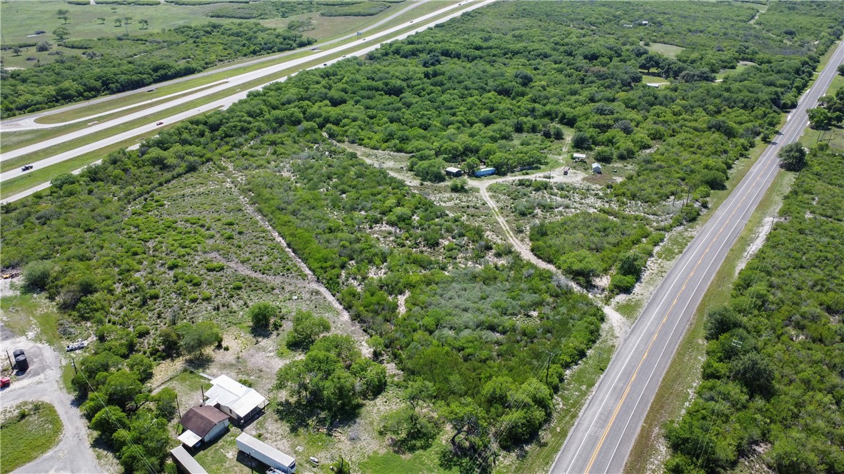 906 Fm 3024 Mathis, TX 78380 - Photo 7 of 25 a view of a yard with plants