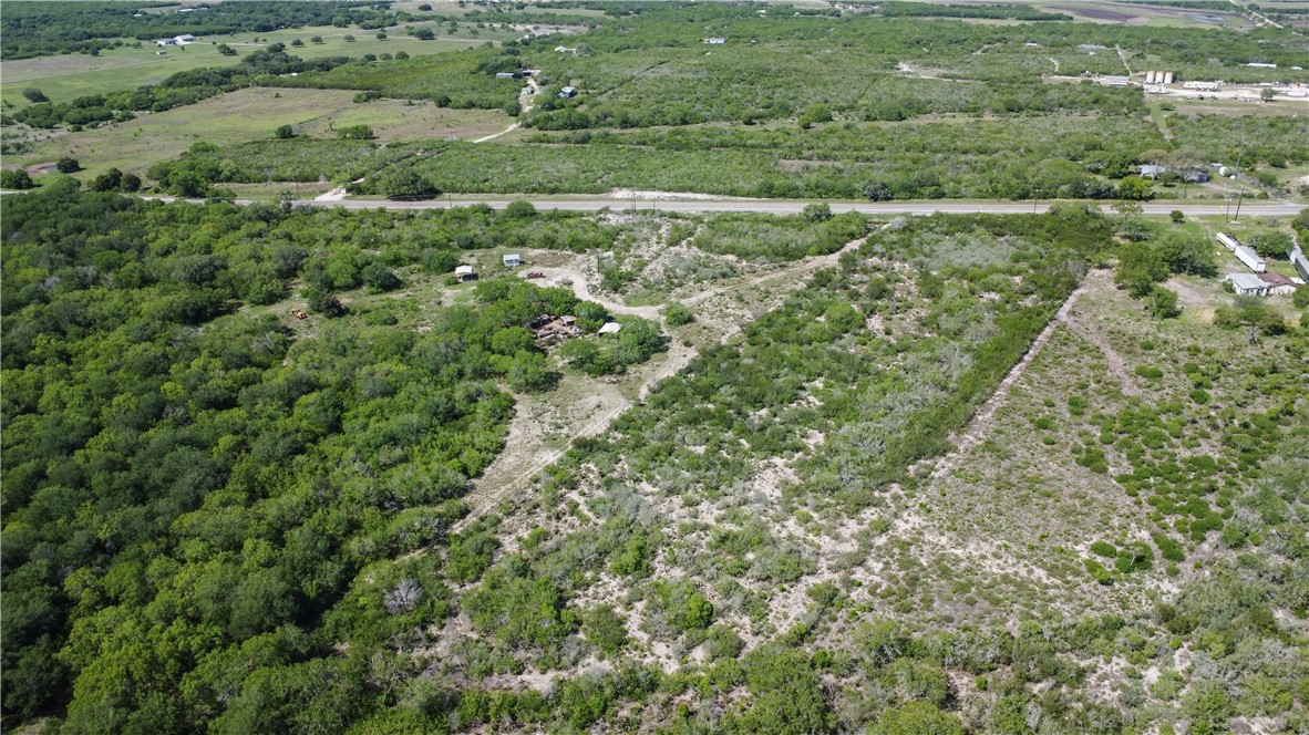 906 Fm 3024 Mathis, TX 78380 - Photo 9 of 25 an aerial view of residential houses with outdoor space and trees