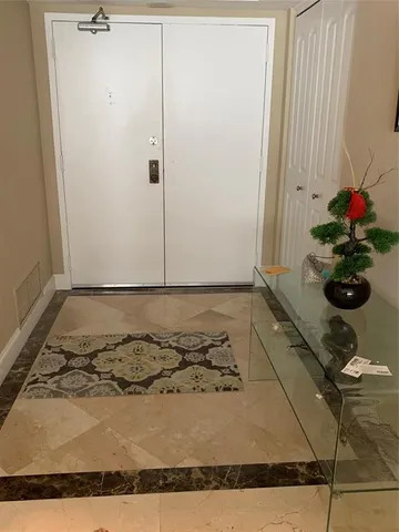 a vase of flowers sitting on a table