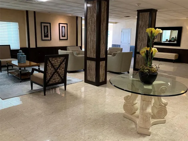 a view of a livingroom with furniture and a couch